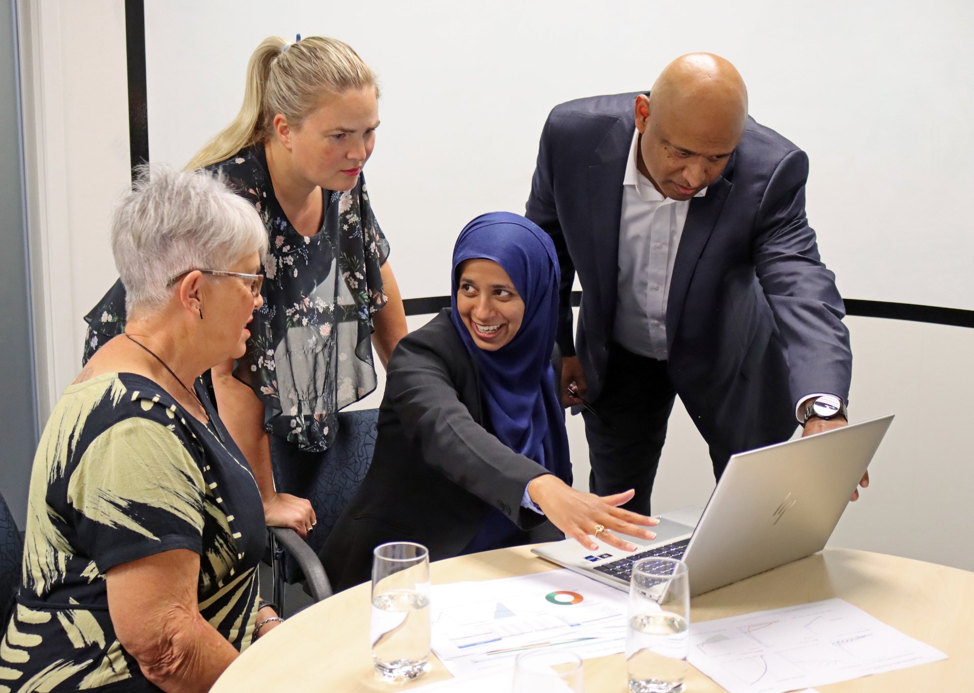 ASMA VCFO team presenting to a board of directors